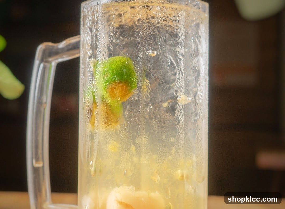 Refreshing Drink with Lime and Fruit
