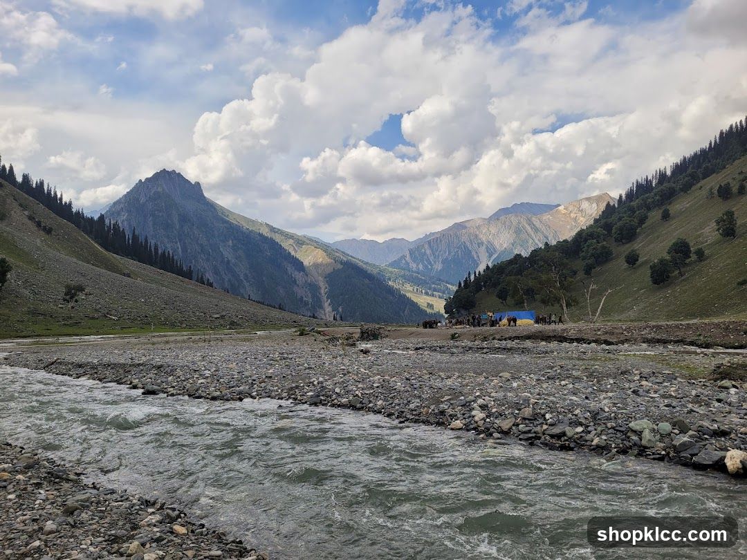 Mountain Landscape with River and Tents