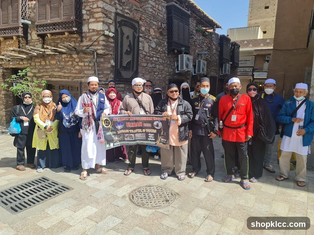 Group Posing with Umrah Banner
