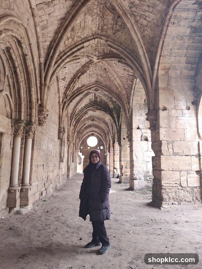 Woman Poses in Ruined Abbey