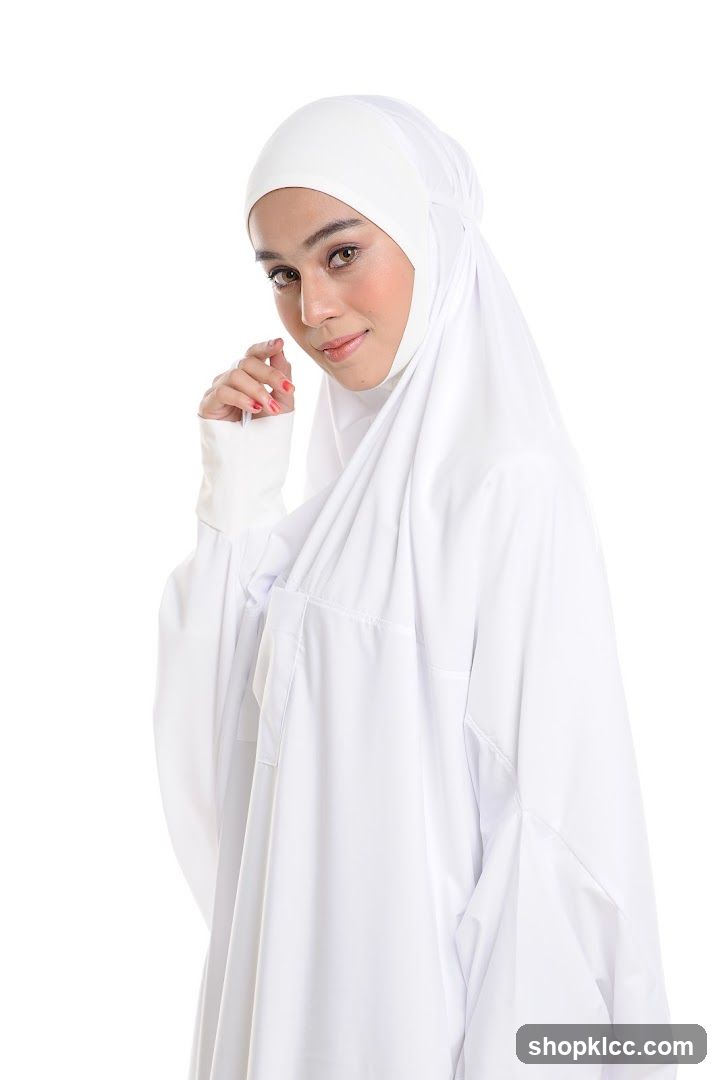 Woman in white prayer garment