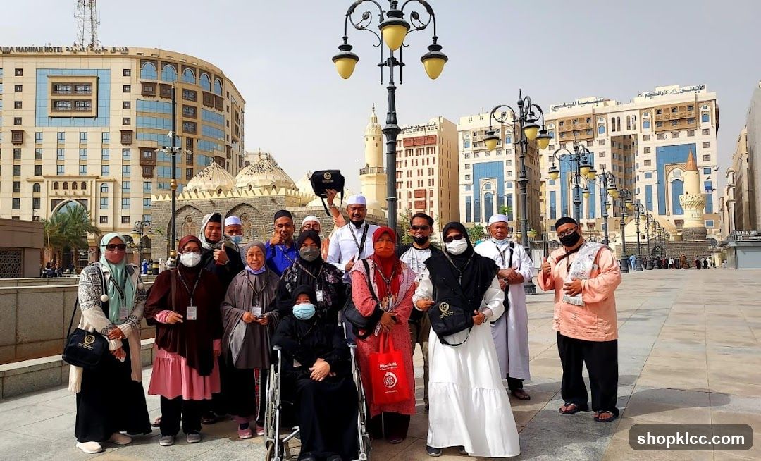 Group of people in front of buildings