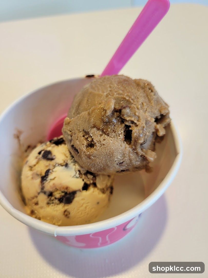 Two scoops of ice cream in a cup