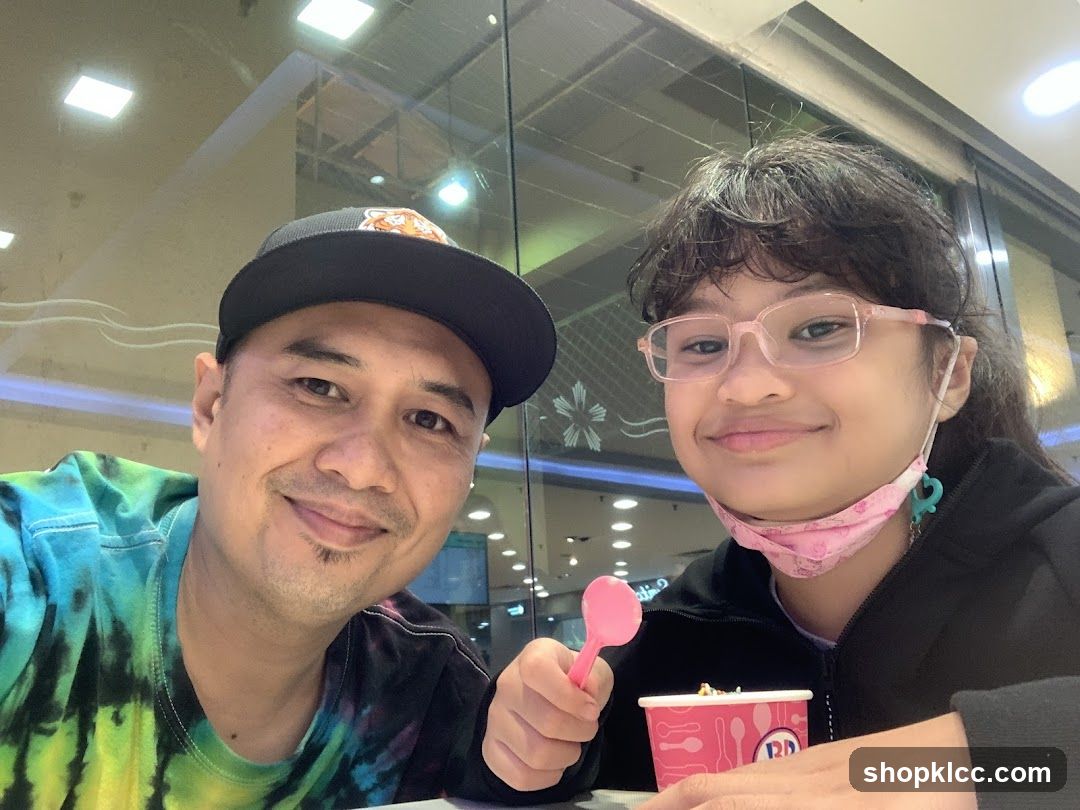 Father and Daughter Enjoying Ice Cream