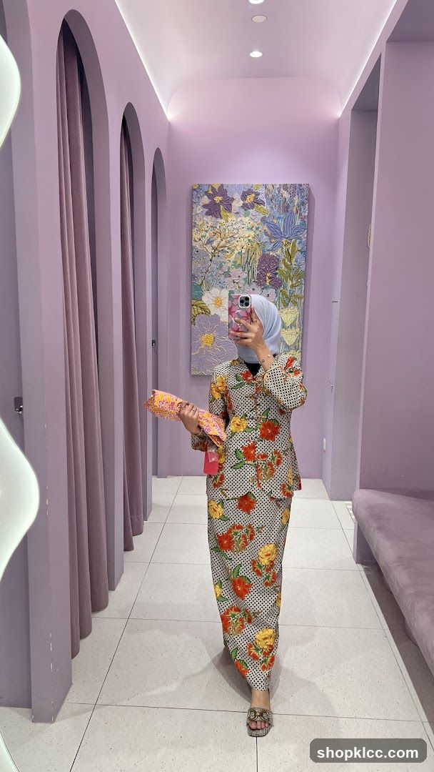 Woman in floral outfit in a boutique