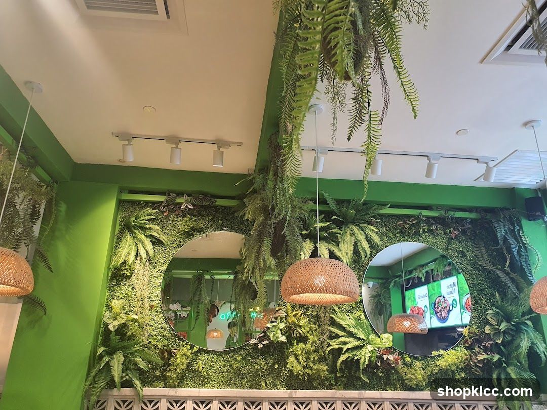 Restaurant Interior with Greenery and Mirrors