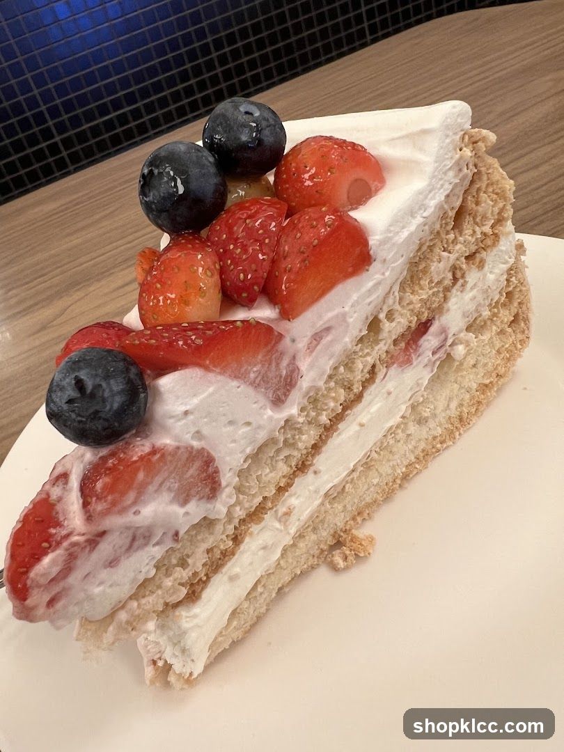 Slice of Strawberry and Blueberry Cake