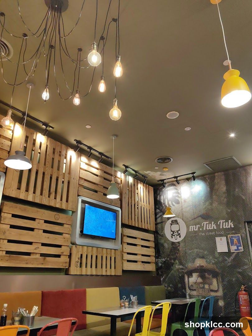 Restaurant Interior with Pallet Wall and Colorful Seating