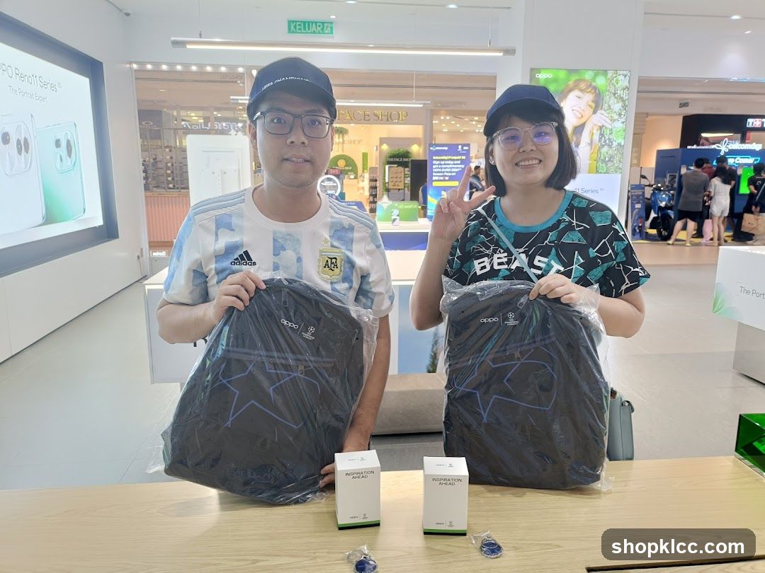 Two people holding branded bags