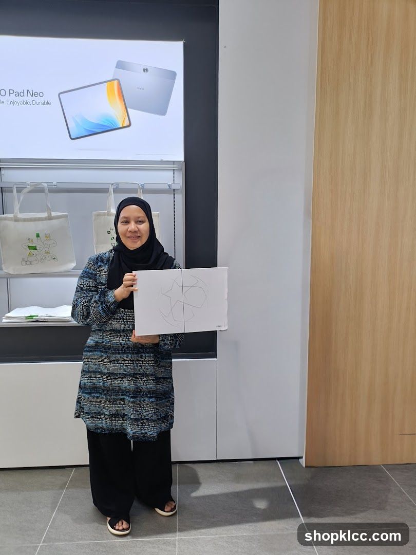 Woman holding a box in a store