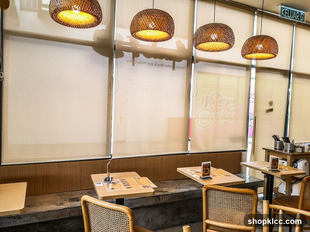Cafe Interior with Wicker Lamps and Seating