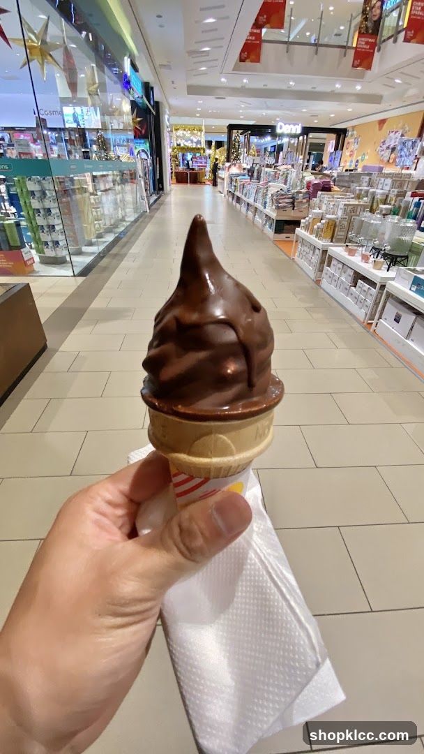 Chocolate soft serve ice cream cone