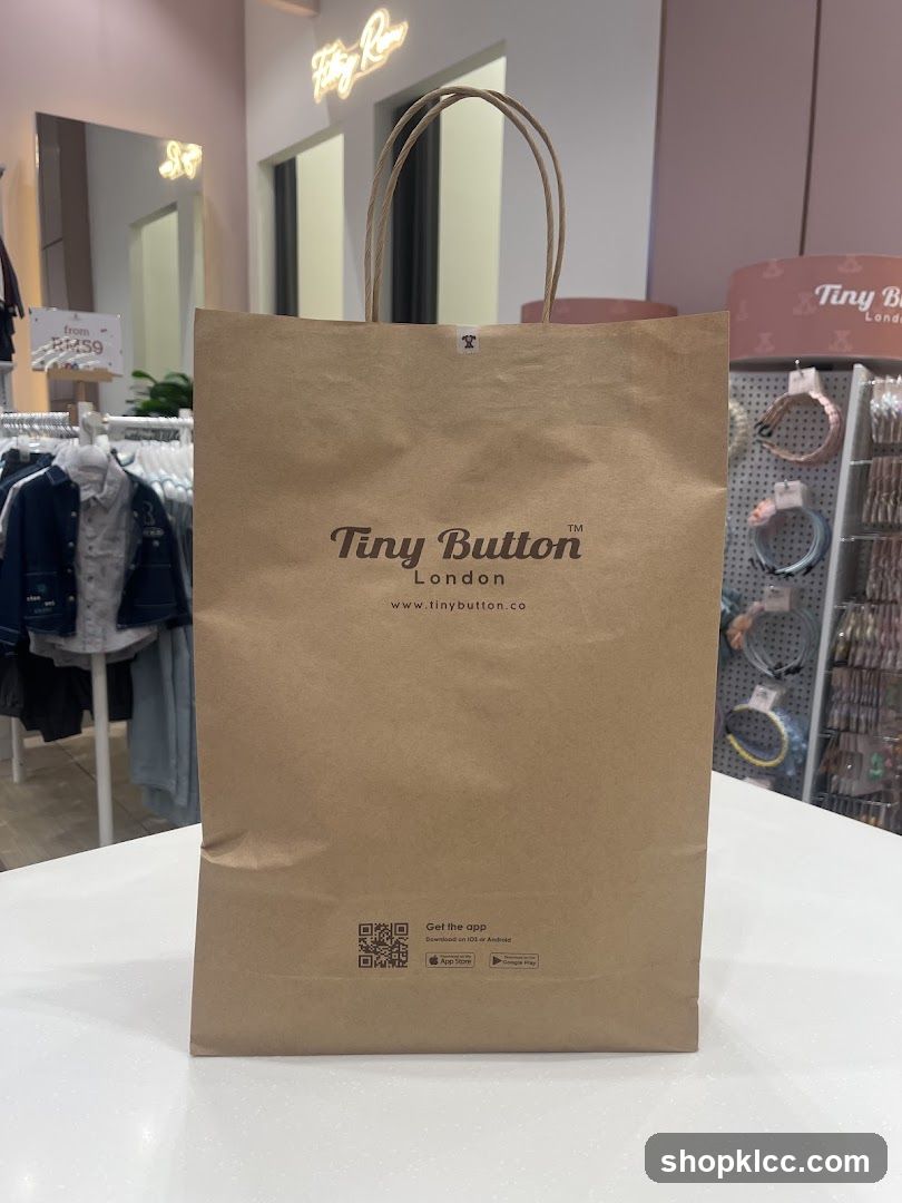 Brown paper shopping bag with store logo