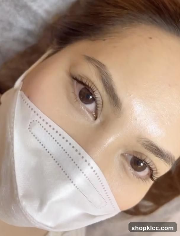 Close-up of a woman's eyes with a mask