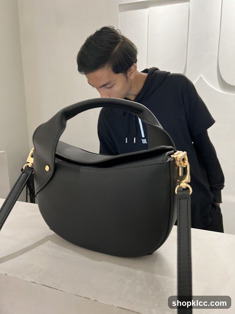Man with Black Handbag