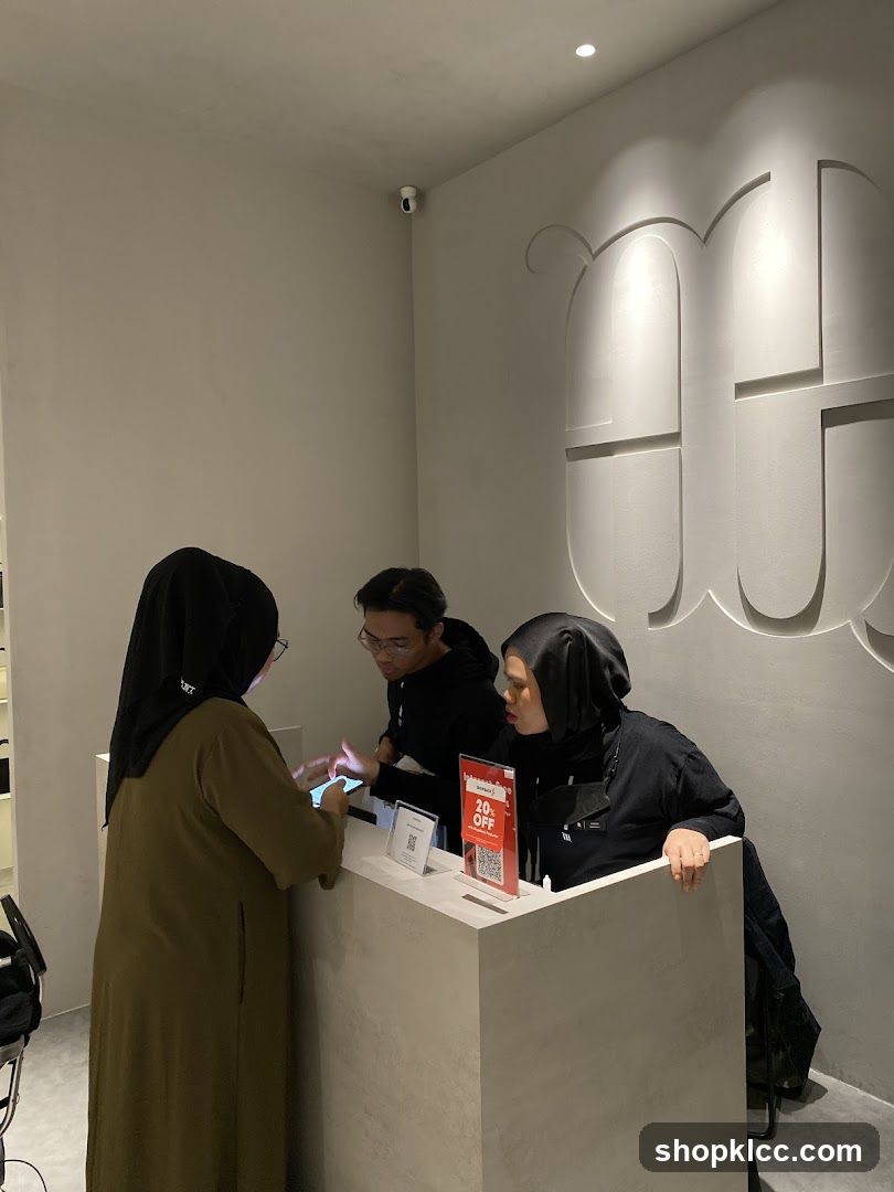 Staff assisting customers at a counter
