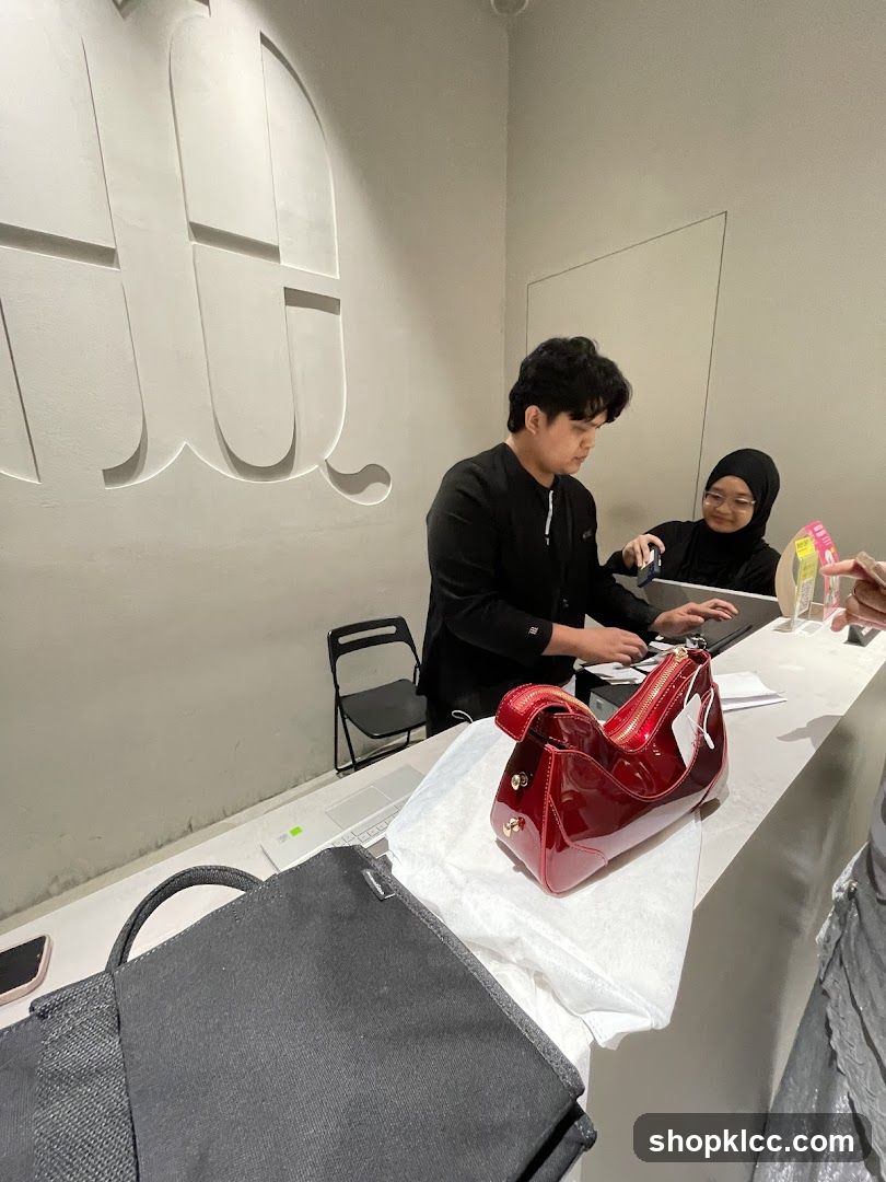 Retail counter with staff and merchandise