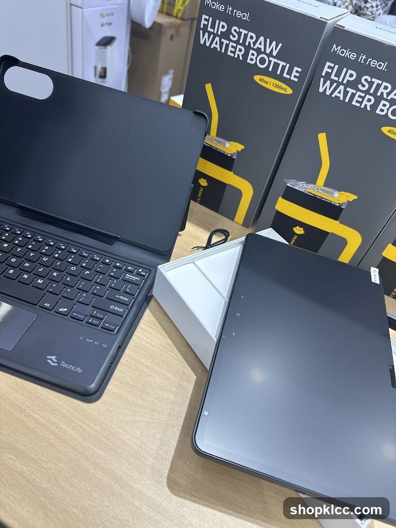Tablet and Keyboard with Water Bottle Packaging