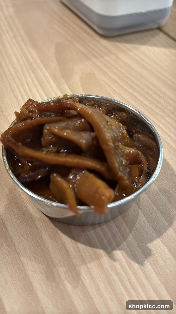 Small bowl of braised food