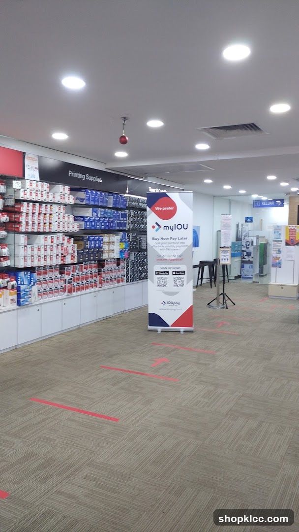 Retail store interior with printing supplies and payment promotion