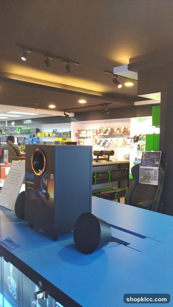 Electronics store interior with gaming equipment
