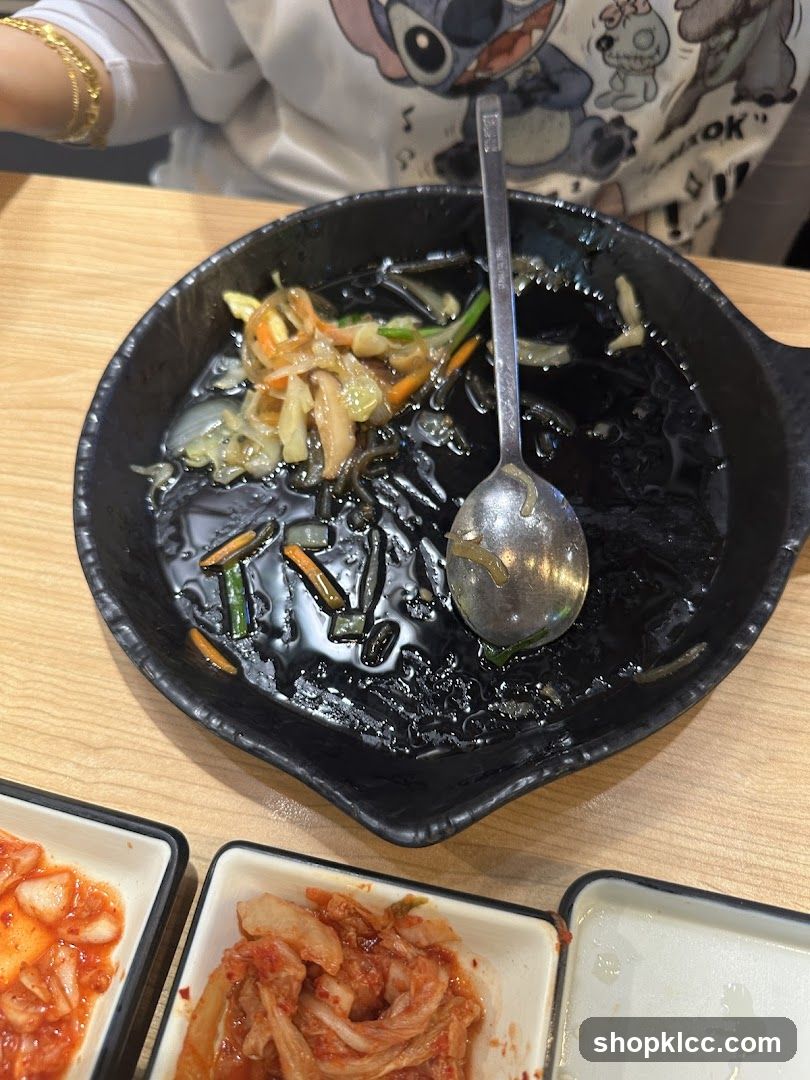 Partially Eaten Meal with Kimchi