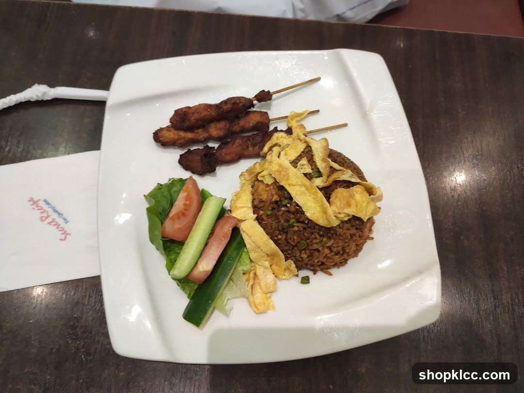 Fried Rice with Chicken Skewers and Salad