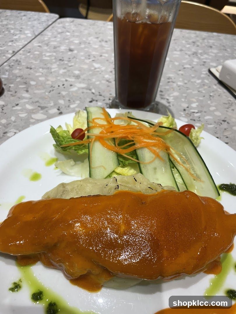 Fish dish with salad and iced tea