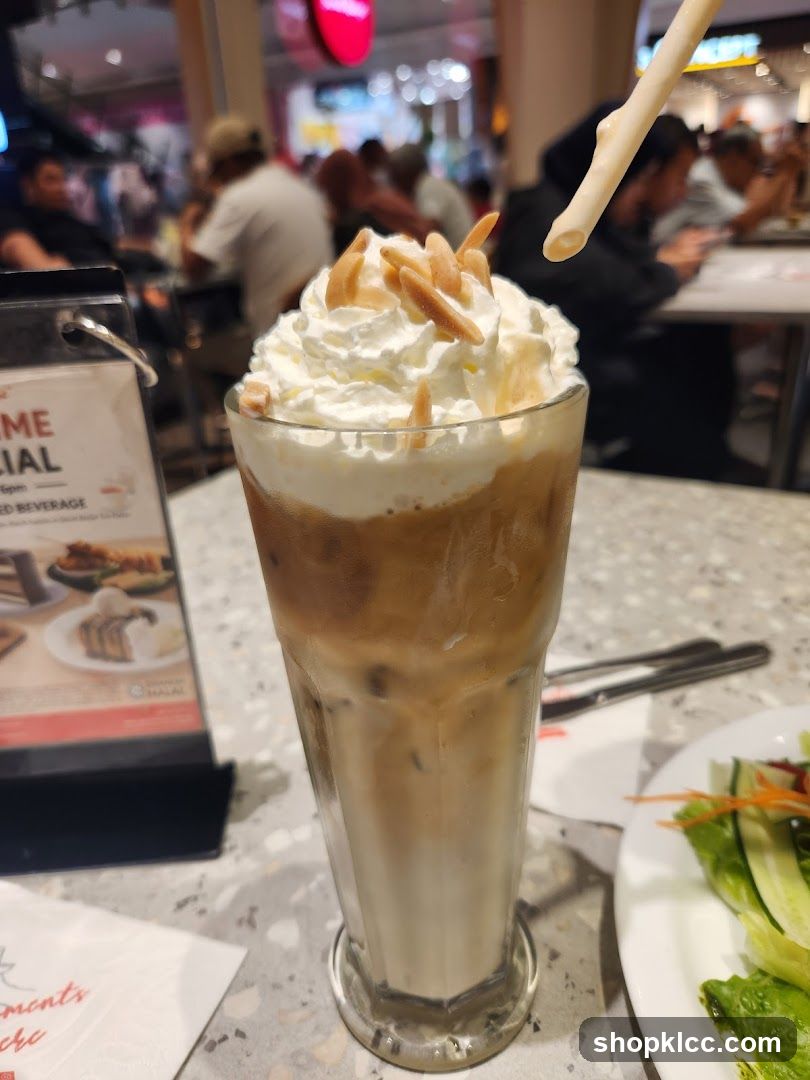 Iced Coffee with Whipped Cream and Almonds
