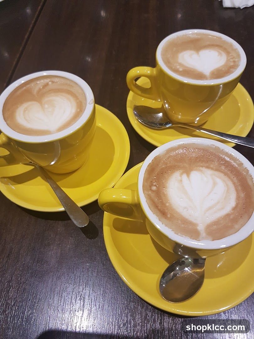 Three Lattes with Heart Art