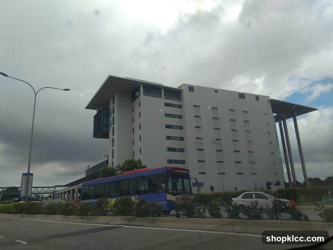 Modern Building with Bus and Cars