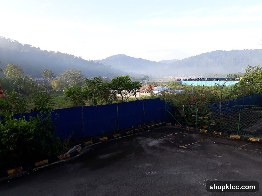 Misty Mountain Landscape with Parking Lot