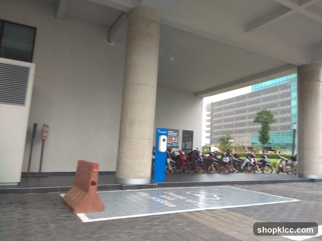 Motorcycle parking area with charging station
