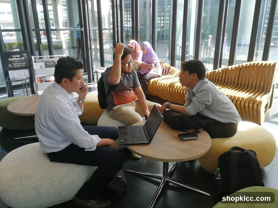 People in a modern lounge area