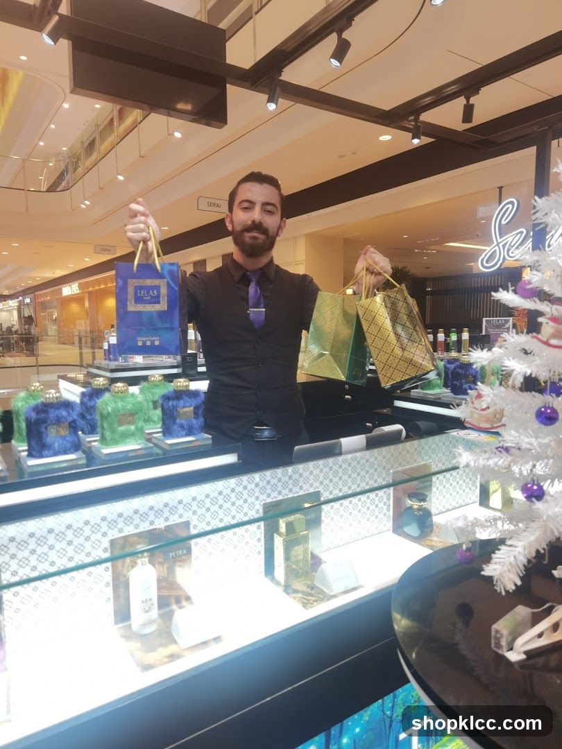 Sales Associate Holding Shopping Bags