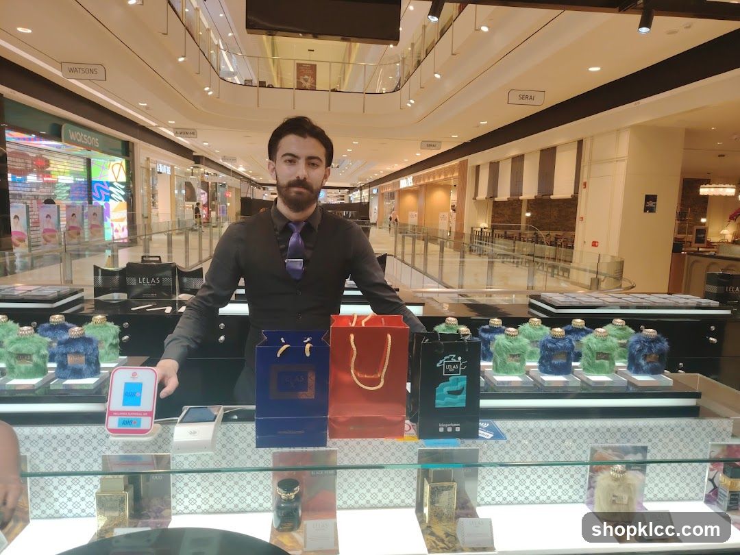 Perfume display with staff