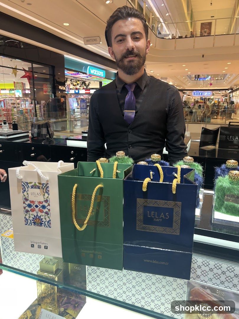 Sales Associate with Perfume Bags