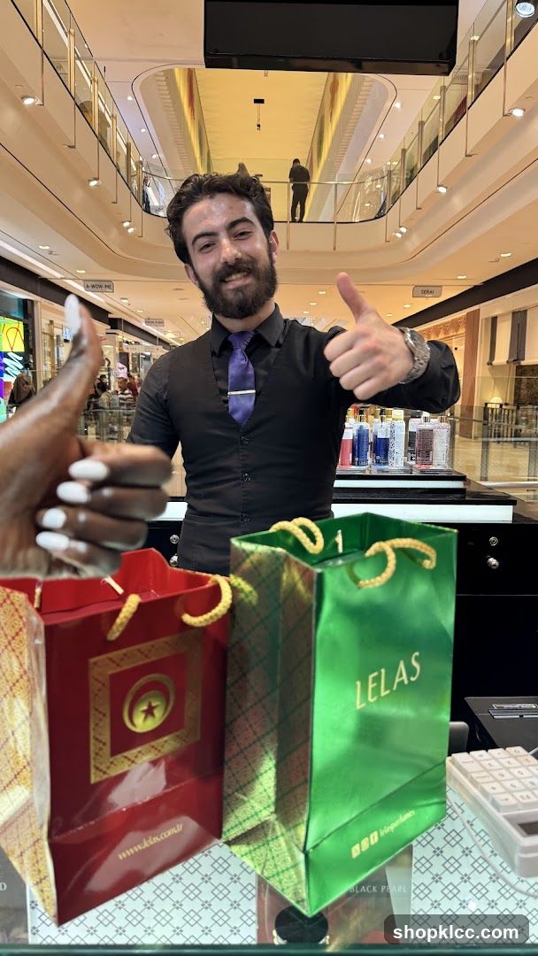 Sales Associate with Shopping Bags