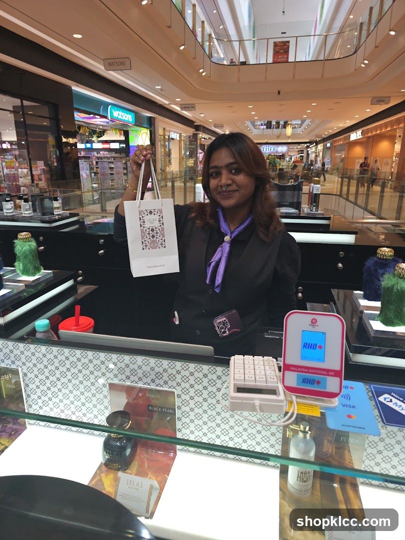 Woman holding a shopping bag in a mall
