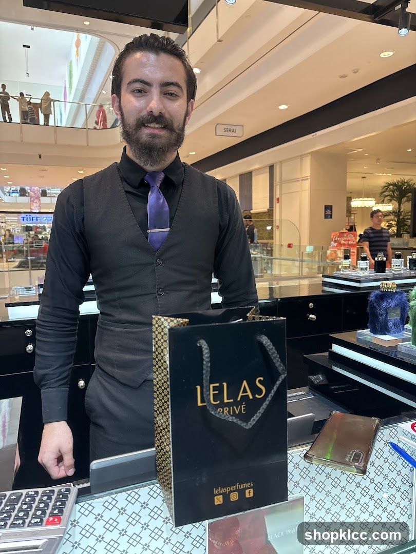 Sales Associate with Shopping Bag