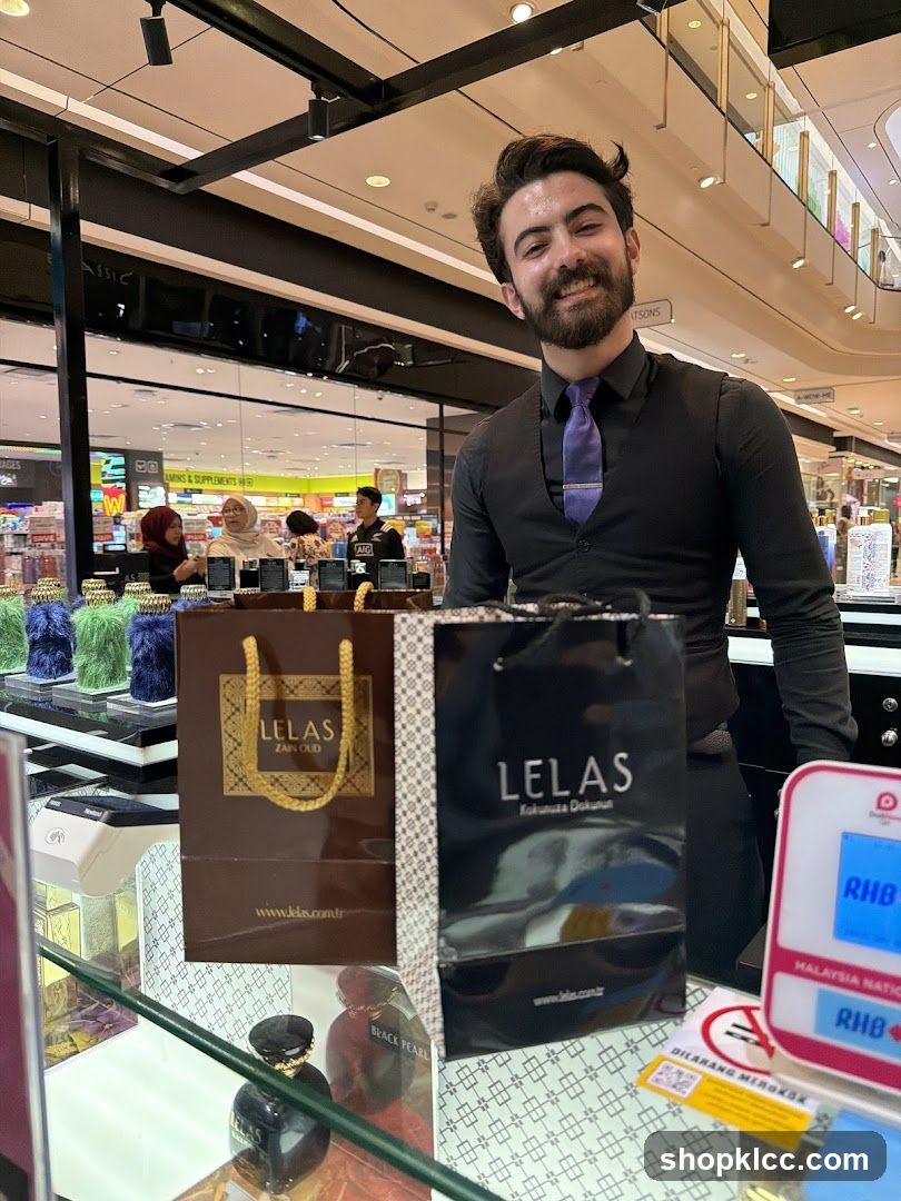 Sales Associate with Shopping Bags