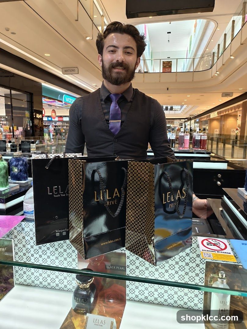 Perfume display with staff