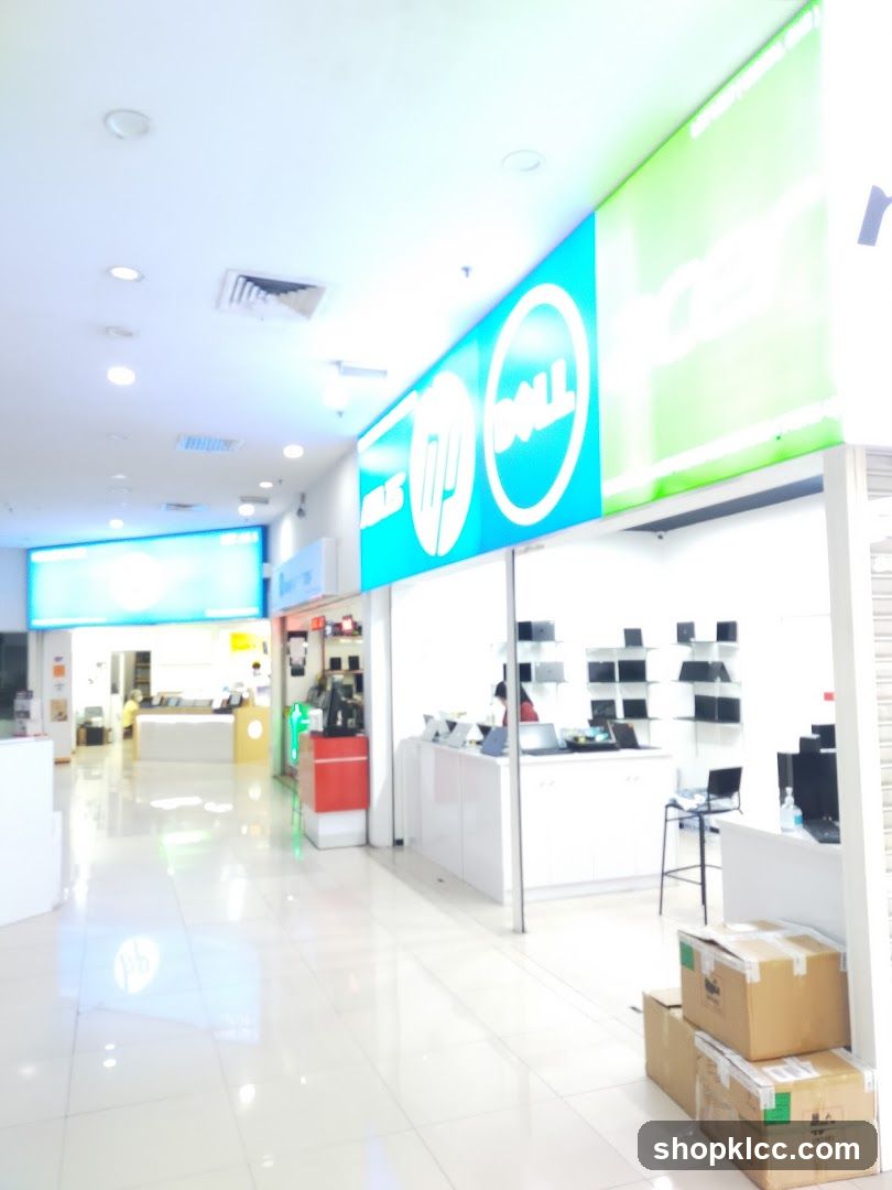 Computer store interior with brand signage