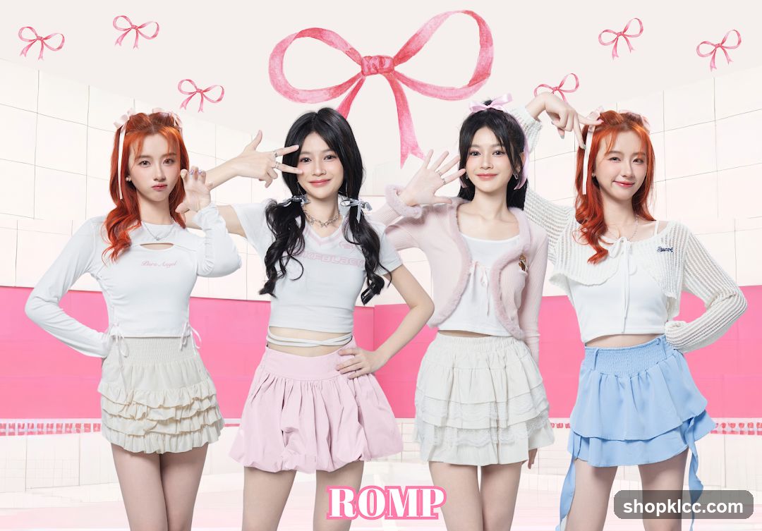 Four young women posing in pastel outfits