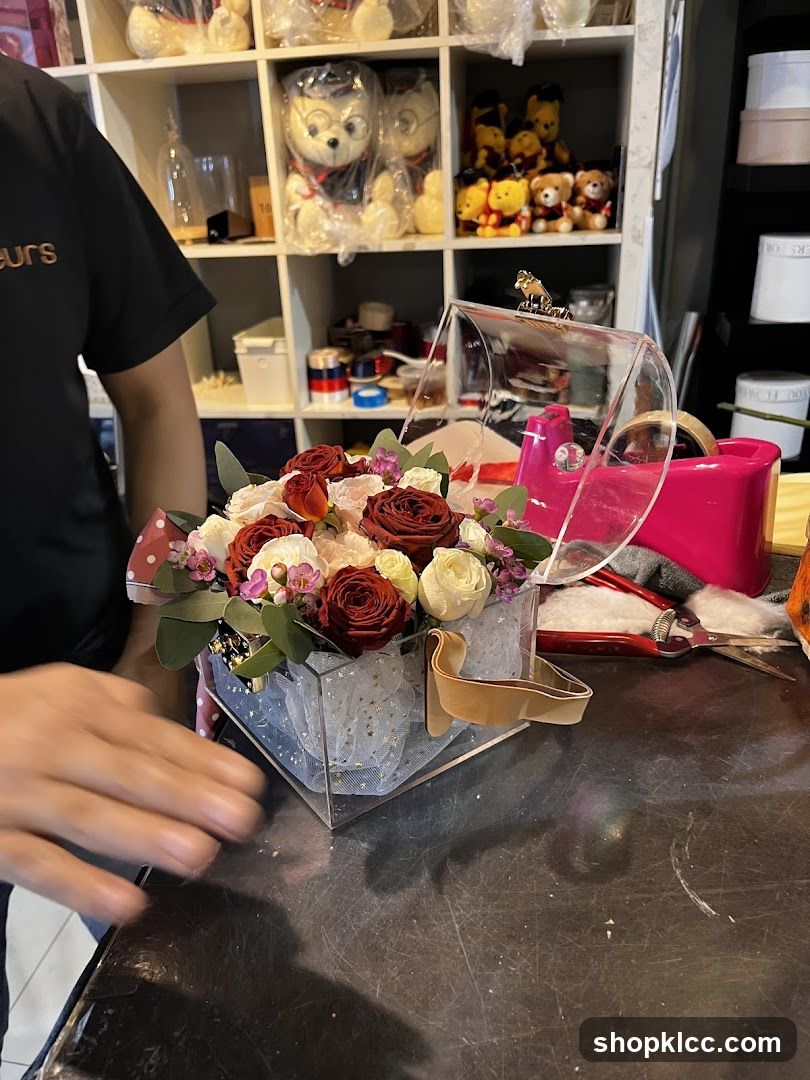 Flower arrangement in a clear box
