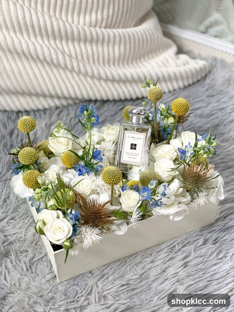 Jo Malone Perfume with Floral Arrangement