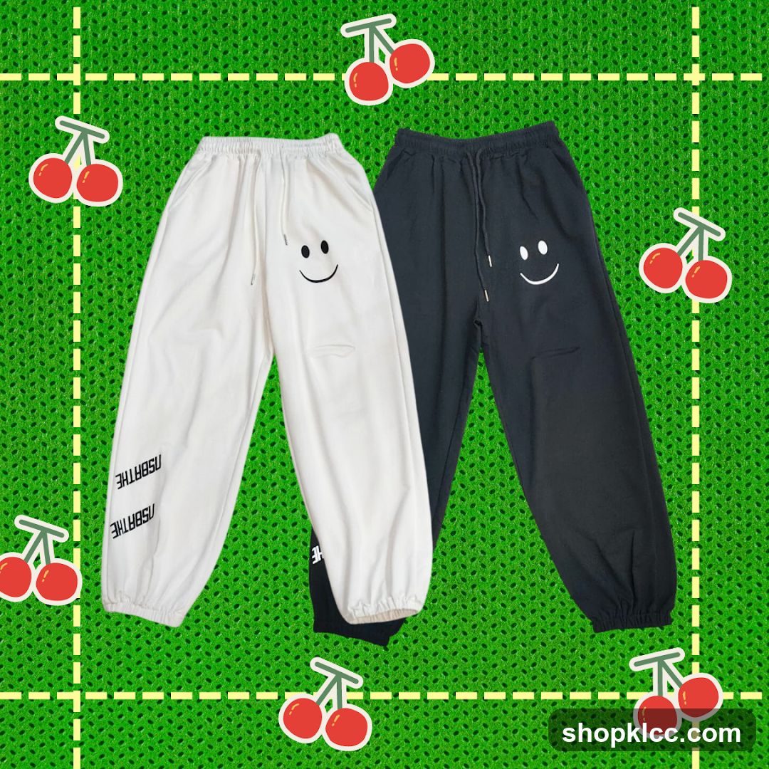 Pants with smiley face graphic