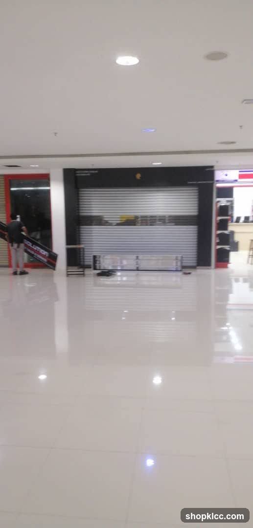 Storefront with Closed Roller Shutters