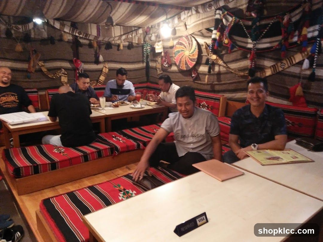 People dining in a tent-like restaurant