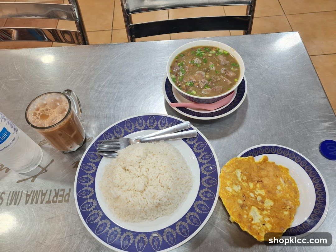 Meal with Rice, Soup, and Omelette